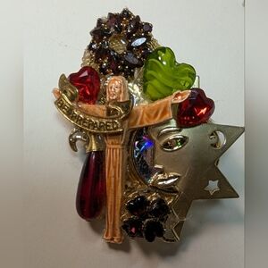 Wendy Gell pin Jesus with a star face red hearts and a halo.